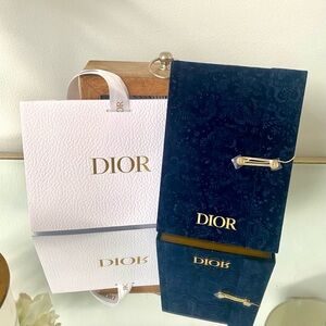Beautiful to gift to someone. Comes with Dior Bag with Ribbon.